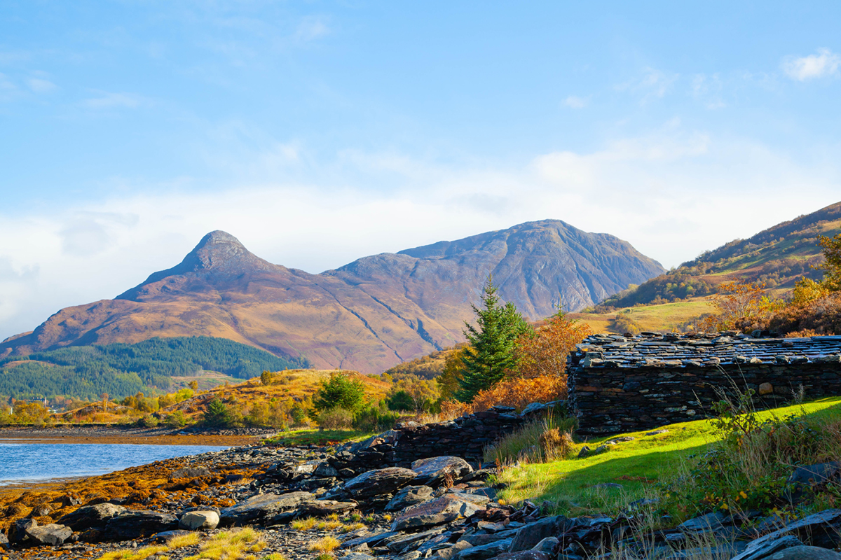 Panorama of Pap of Glencoe and surrounding Scottish Highlands landscape