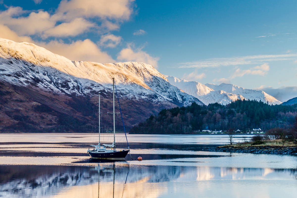 Winter at Loch Leven in Glencoe with snow coating the mountains